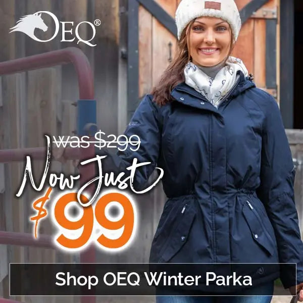 Woman wearing a navy winter parka with promotional text for OEQ Winter Paka now just $99